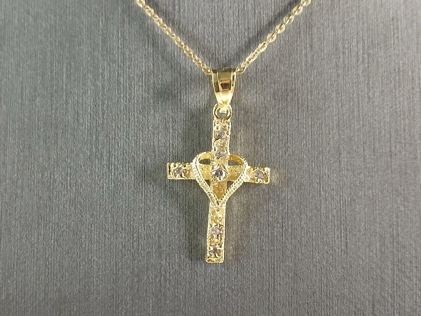 Womens Sterling Silver Gold Tone Religious Heart Cross Necklace: A VERY NICE STERLING SILVER GOLD TONE RELIGIOUS HEART CROSS NECKLACE THAT WEIGHS 3.2g. THE NECKLACE MEASURES 18" LONG AND THE PENDANT MEASURES 1 1/8" LONG BY 5/8" WIDE. ANY QUESTIONS PLEASE DONT HESIT