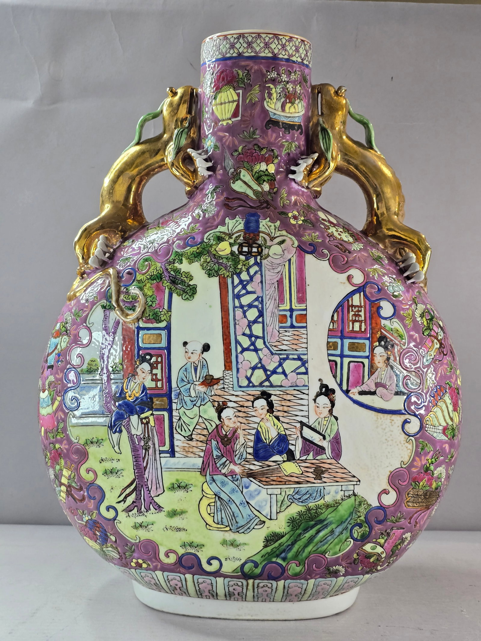 Decorative Vintage Antique Chinese Porcelain Famille Rose Medallion Vase: A beautiful vintage antique Chinese Famille Rose Medallion vase that measures about 18 7/8" by about 14" by 6". Condition looks great. No chips or cracks. Not sure who the maker is. Any questions plea