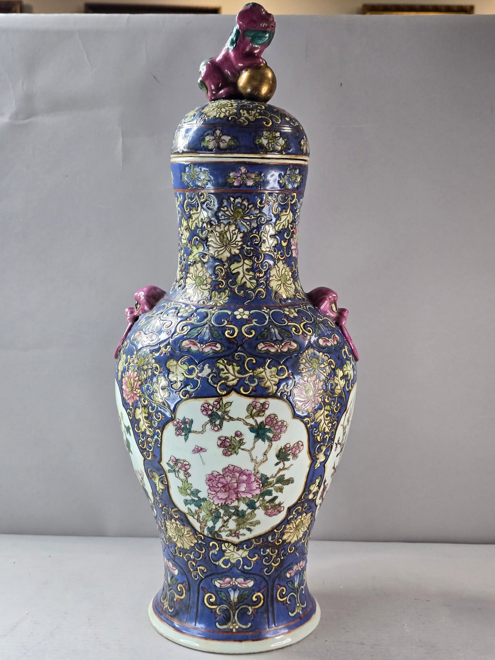 Vintage Antique Chinese Porcelain Famille Rose Medallion 4 Seasons Vase: A beautiful vintage antique Chinese Famille Rose Medallion 4 seasons vase with foo dogs that measures about 21 1/2" by about 8". Condition is very good. Not sure who the maker is. Any questions please