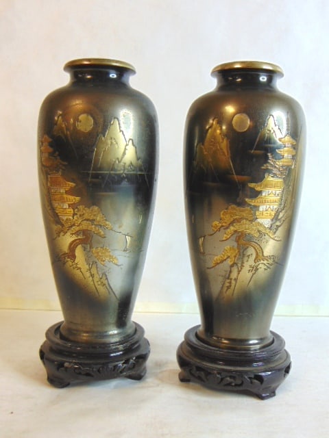 PR VINTAGE ANTIQUE JAPANESE BRASS ETCHED VASES: AN AMAZING PAIR OF VINTAGE ANTIQUE JAPANESE ETCHED BRASS VASES THAT MEASURE 8 1/4" TALL BY 3 1/2" WIDE. VASES ARE MARKED ALONG THE SIDE, BUT NOT SURE WHO THE MAKER IS. CONDITION IS GOOD WITH SOME MINO