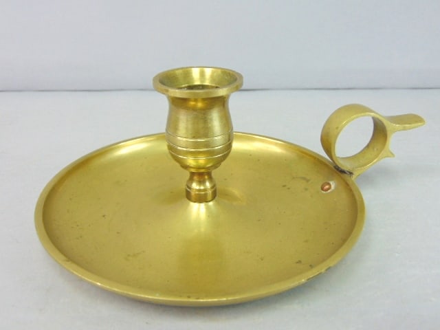 Decorative Vintage Antique Brass Candlestick Holder: A DECORATIVE VINTAGE ANTIQUE BRASS CANDLESTICK HOLDER THAT MEASURES 2 1/2" TALL BY 5 3/4" IN DIAMETER AT THE BASE. ANY QUESTIONS PLEASE DO NOT HESITATE TO ASK. BE SURE TO CHECK OUT SOME OF OUR OTHER G