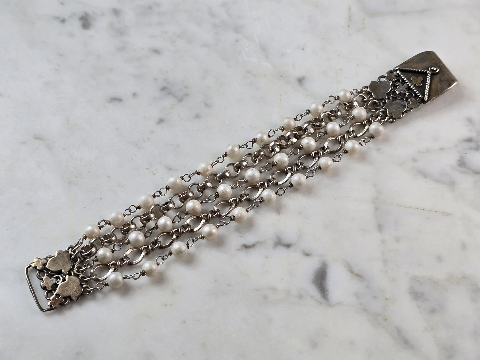 Womens Vintage Estate Sterling Silver Designer Safia Day Bracelet: A WOMENS VINTAGE ESTATE STERLING SILVER DESIGNER SAFIA DAY BRACELET. BRACELET MEASURES 7 1/4" LONG BY 1/2" WIDE AND WEIGHS 43.2g. NOT SURE IF PEARLS ARE NATURAL OR FAUX. HER ITEMS SELL FOR BIG MONEY O