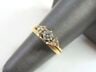Womens 14K Yellow Gold Diamond Engagement Ring: FOR SALE IS THIS VINTAGE 14K YELLOW GOLD WOMEN'S ENGAGEMENT RING WITH DIAMONDS. THE CENTER DIAMOND IS .25cts SURROUNDED BY SIX .05ct SMALLER DIAMONDS. THE RING SIZE 5.75, AND WEIGHS 3.4g. THE LUSTER O