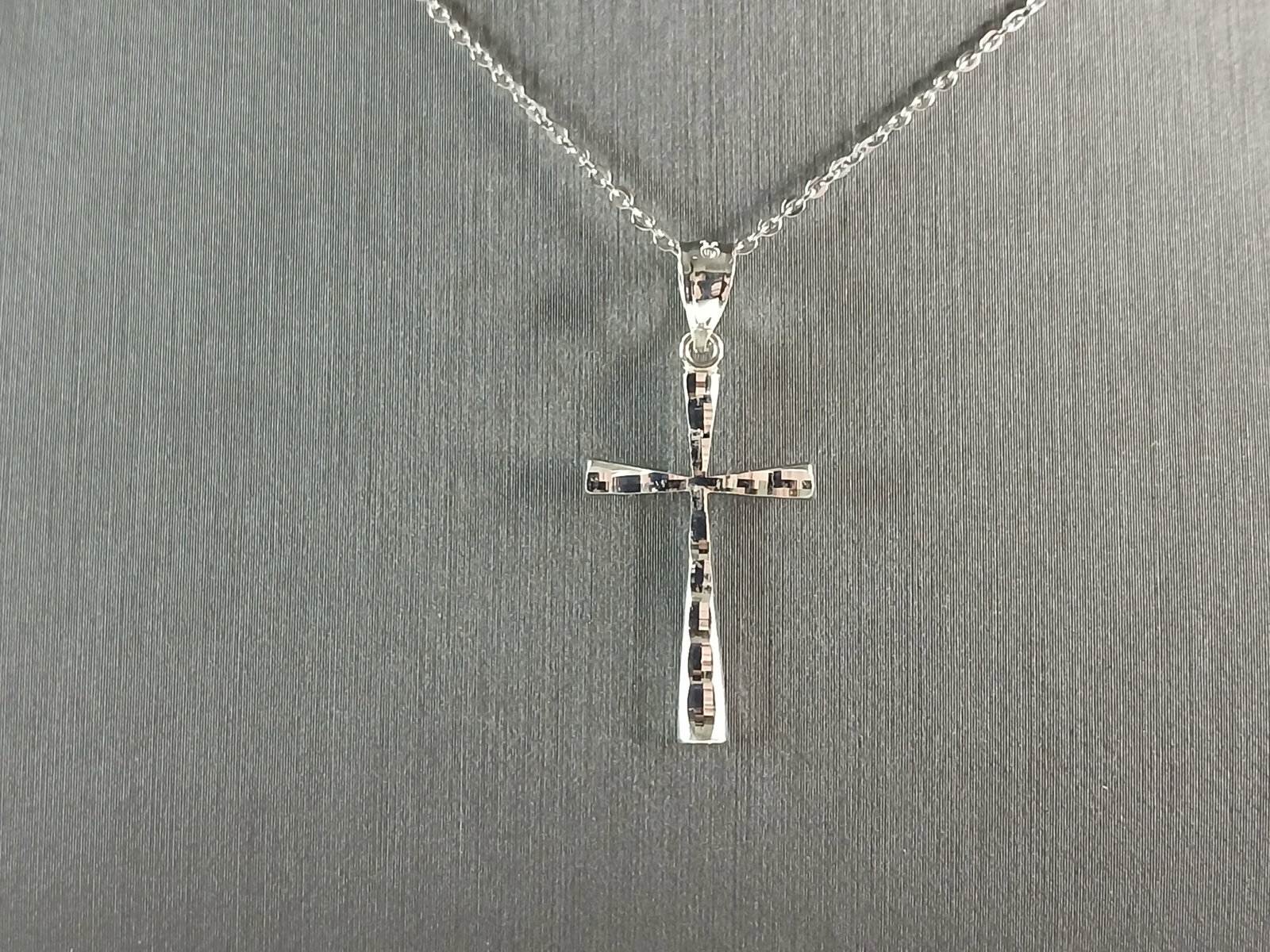 Womens Sterling Silver Religious Modernist Cross Pendant Necklace: A VERY NICE STERLING SILVER RELIGIOUS MODERNIST CROSS PENDANT WITH NECKLACE THAT WEIGHS 2.6g. THE PENDANT MEASURES 1 1/4" LONG BY 1/2" WIDE. THE NECKLACE MEASURES 18" LONG. ANY QUESTIONS PLEASE DONT H