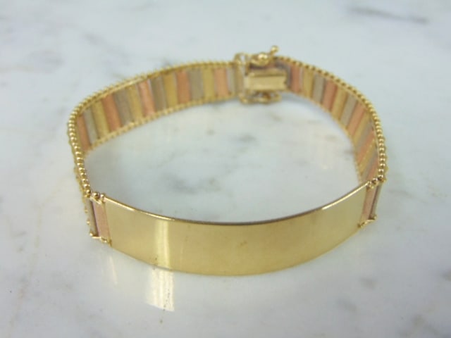 Womens Estate 14k Rose Yellow & White Gold ID Bracelet: A WOMENS VINTAGE ESTATE 14K YELLOW, ROSE AND WHITE GOLD ID BRACELET. THE BRACELET MEASURES 7" LONG BY 1/2" AND WEIGHS 21.2g. ANY QUESTIONS PLEASE DO NOT HESITATE TO ASK. BE SURE TO CHECK OUT SOME OF O
