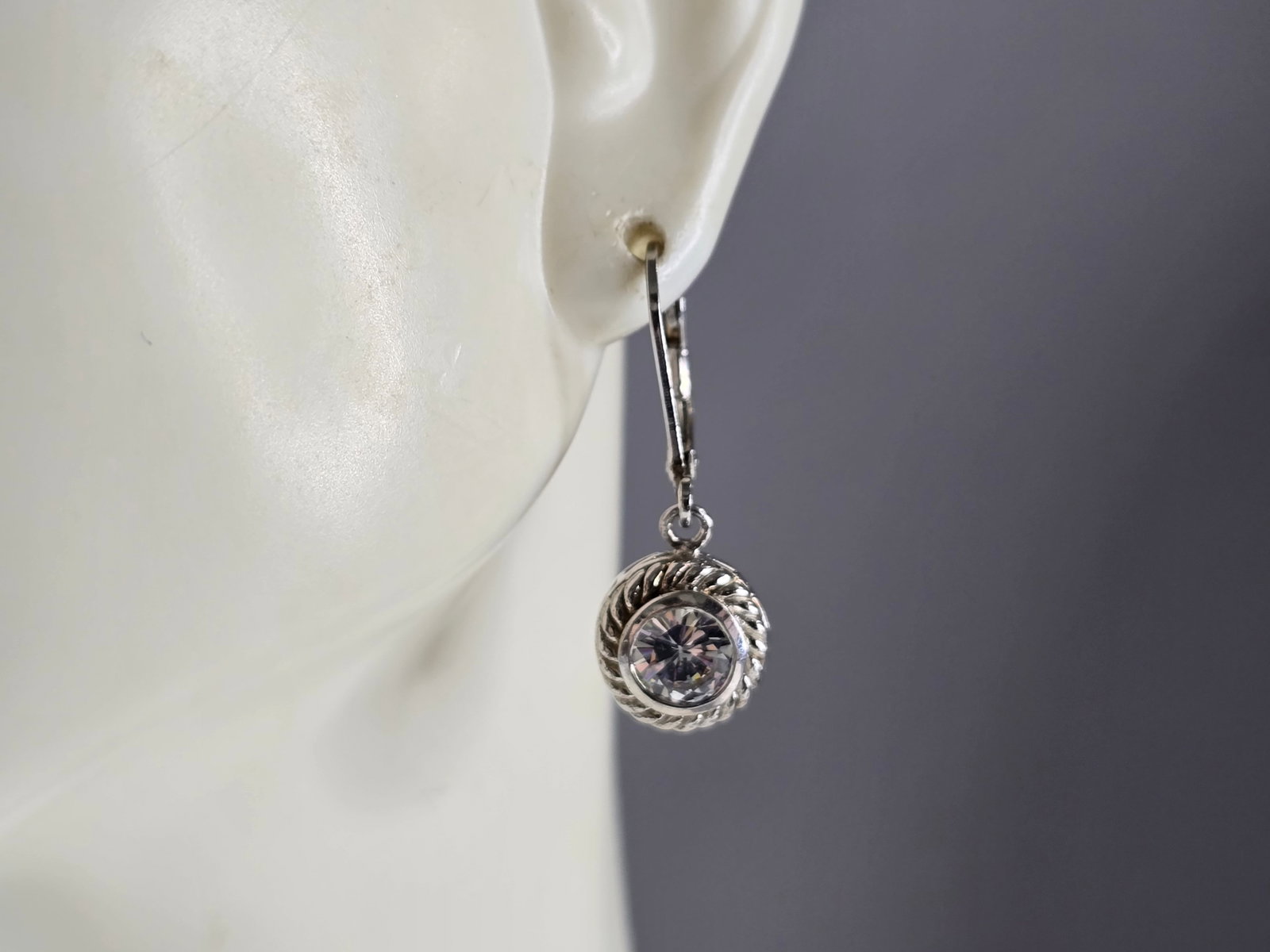 Womens Estate Sterling Silver CZ Dangle Earrings: A PAIR OF WOMENS STERLING SILVER CZ DANGLE EARRINGS THAT WEIGH 3.8g AND MEASURES 1" LONG BY 3/8" WIDE. ANY QUESTIONS, PLEASE DO NOT HESITATE TO ASK. BE SURE TO CHECK OUT SOME OF MY OTHER GREAT ITEMS U