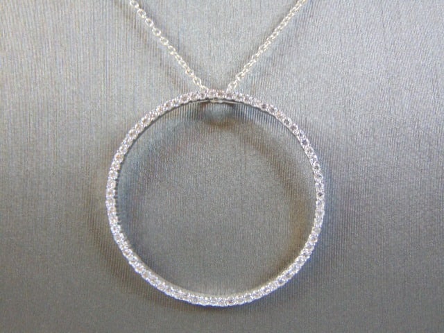 Womens Vintage Estate CZ Stones Pendant W/ Necklace: A BEAUTIFUL VINTAGE ESTATE WOMEN'S .925 STERLING SILVER CZ STONES PENDANT WITH NECKLACE . THE PENDANT MEASURES 1 1/2" IN DIAMETER , AND WEIGHS 7.5g. NECKLACE MEASURES 18 1/8". WOULD MAKE A GREAT GIFT 