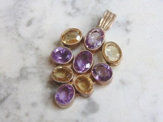 Womens Vintage Sterling Silver Multi Stone Pendant: A WOMENS VINTAGE ESTATE STERLING SILVER MULTI STONE PENDANT . NOT SURE IF STONES ARE REAL OR MAN MADE. PENDANT WEIGHS 25.0g AND PENDANT MEASURES 2 5/8" LONG BY 1 1/2" WIDE. MAKES A GREAT GIFT FOR THAT