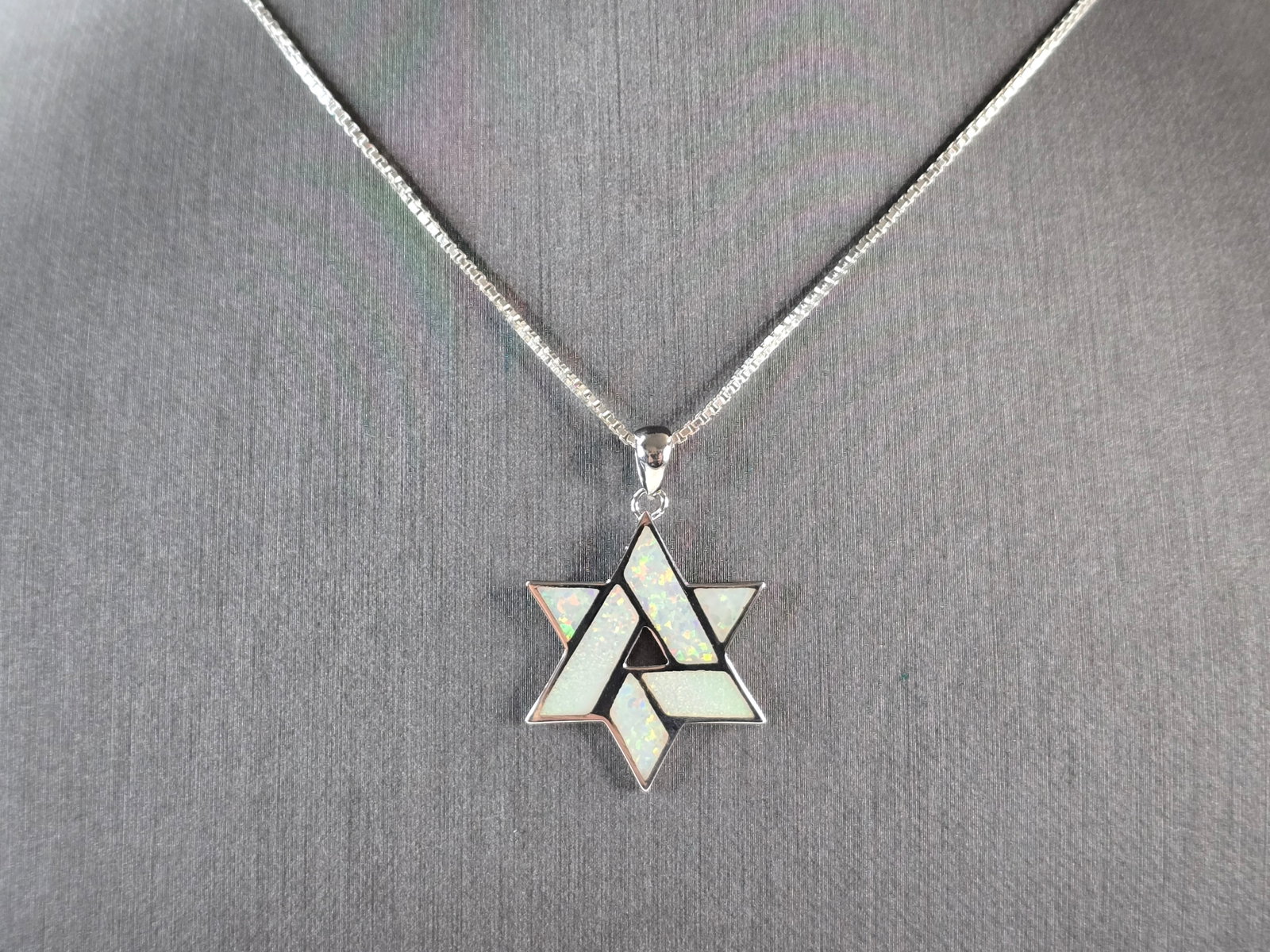Sterling Silver Jewish Judaica Star of David Opal Pendant Necklace: A VINTAGE ESTATE STERLING SILVER MODERNIST STAR OF DAVID OPAL PENDANT WITH NECKLACE. THE PENDANT AND NECKLACE TOGETHER WEIGH 7.0g. THE NECKLACE MEASURES 18 1/2", AND THE PENDANT MEASURES 1 1/4" LONG B