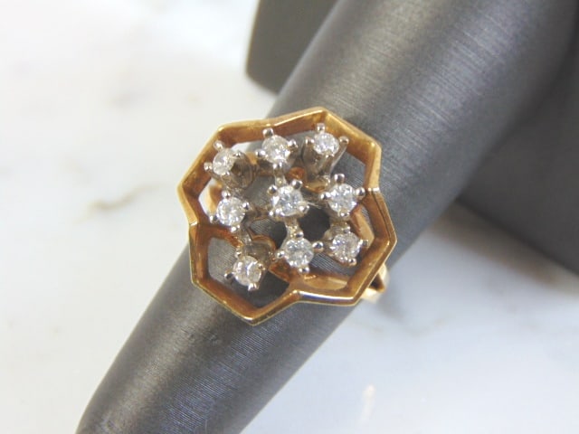 Vintage Estate 14k Yellow Gold Diamond Ring: FOR SALE IS THIS EXQUISITE VINTAGE ESTATE 14K YELLOW GOLD DIAMOND RING. THE RING WEIGHS 5.4g WITH THE DIAMONDS. THE SIZE OF THE RING IS A 6. THE CARAT WEIGHT OF THE DIAMONDS ARE ABOUT .63cts. ANY OTHE