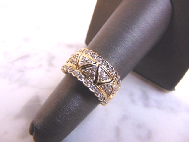 Women's 14K Yellow Gold Diamond Ring: FOR SALE IS THIS 14K YELLOW GOLD DIAMOND RING WITH ABOUT .48cts OF DIAMONDS IN IT. THE RING WEIGHS 4.7g. THE SIZE OF THE RING IS A 5.5. THE WIDTH OF THE RING IS 3/8". RING IS NOT MARKED BT IT HAS BEEN