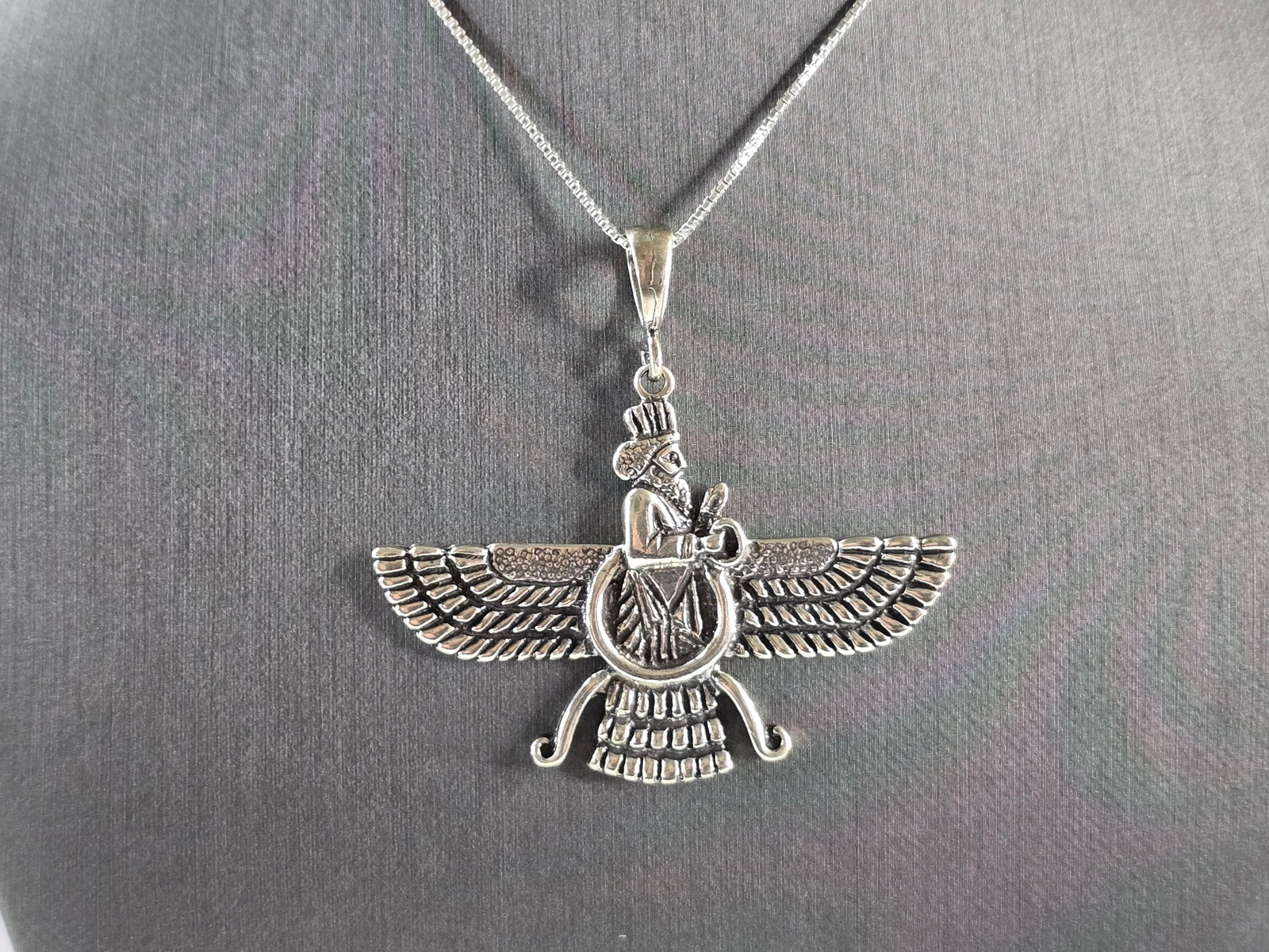 Womens Estate Sterling Silver Persian Faravahar Pendant Necklace: A WOMENS VINTAGE ESTATE STERLING SILVER PERSIAN FARAVAHAR PENDANT NECKLACE. THE NECKLACE WITH PENDANT WEIGHS 15.7g. NECKLACE MEASURES 18" LONG. THE PENDANT MEASURES 2" BY 2 1/4". MAKES A GREAT GIFT FO