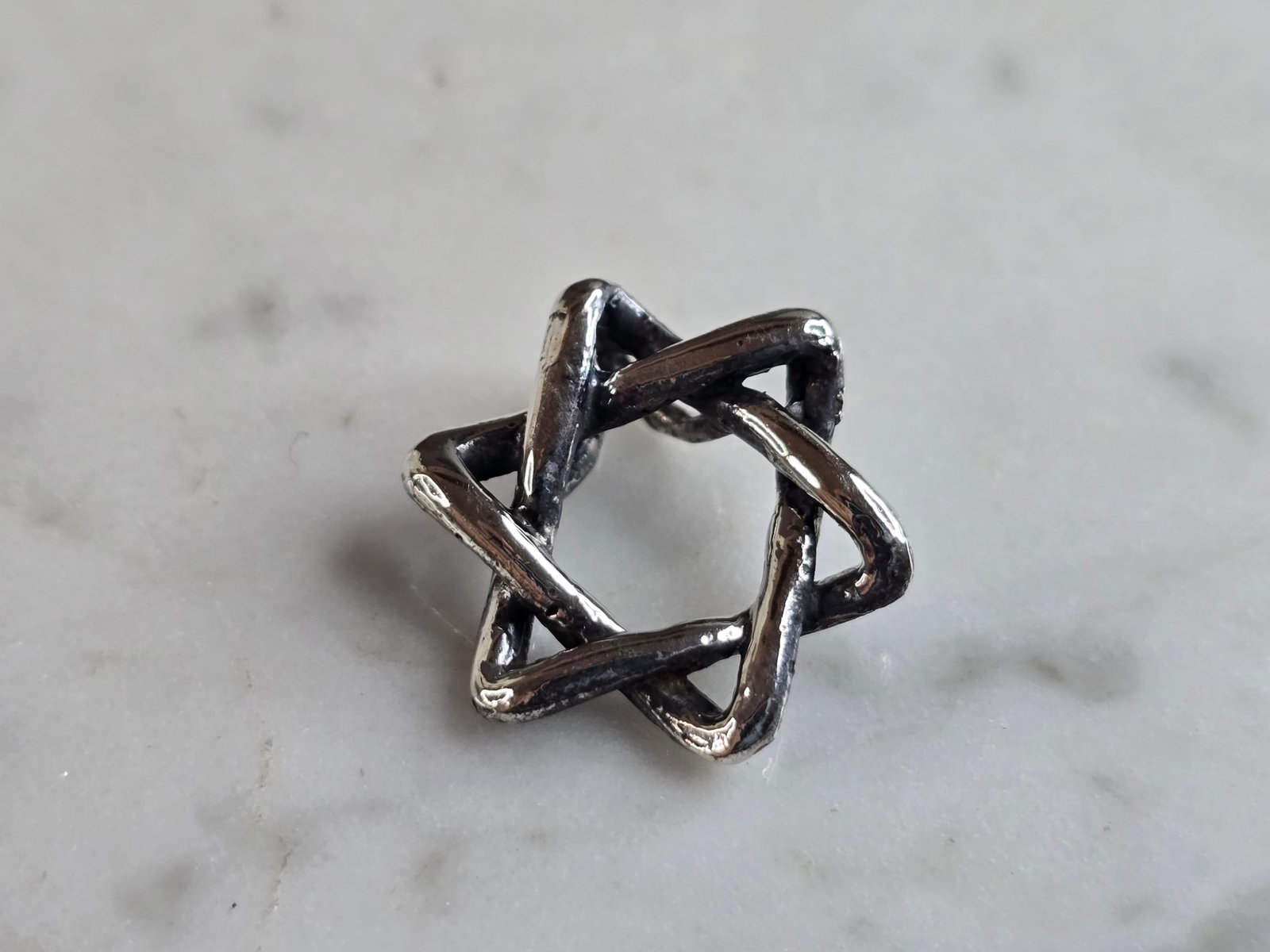 Vintage Estate Sterling Silver Star of David Modernist Pendant: A VINTAGE ESTATE STERLING SILVER STAR OF DAVID MODERNIST STYLE PENDANT. PENDANT WEIGHS 2.6g, AND MEASURES 5/8" WIDE BY 5/8" LONG. MAKES A GREAT GIFT FOR THAT SPECIAL SOMEONE. ANY QUESTIONS, PLEASE DO 