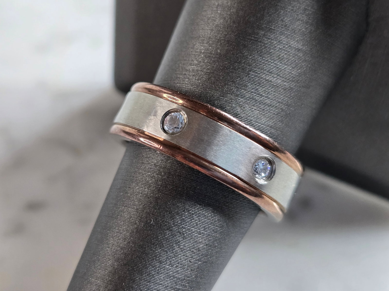 Mens Estate Stainless Steel Wedding Band Ring: A MENS ESTATE STAINLESS STEEL WEDDING BAND RING. THE RING IS A SIZE 9.0 AND IS ABOUT 1/4" WIDE. STONES ARE CZ. ANY QUESTIONS PLEASE DONT HESITATE TO ASK. BE SURE TO CHECK OUT SOME OF MY OTHER GREAT IT