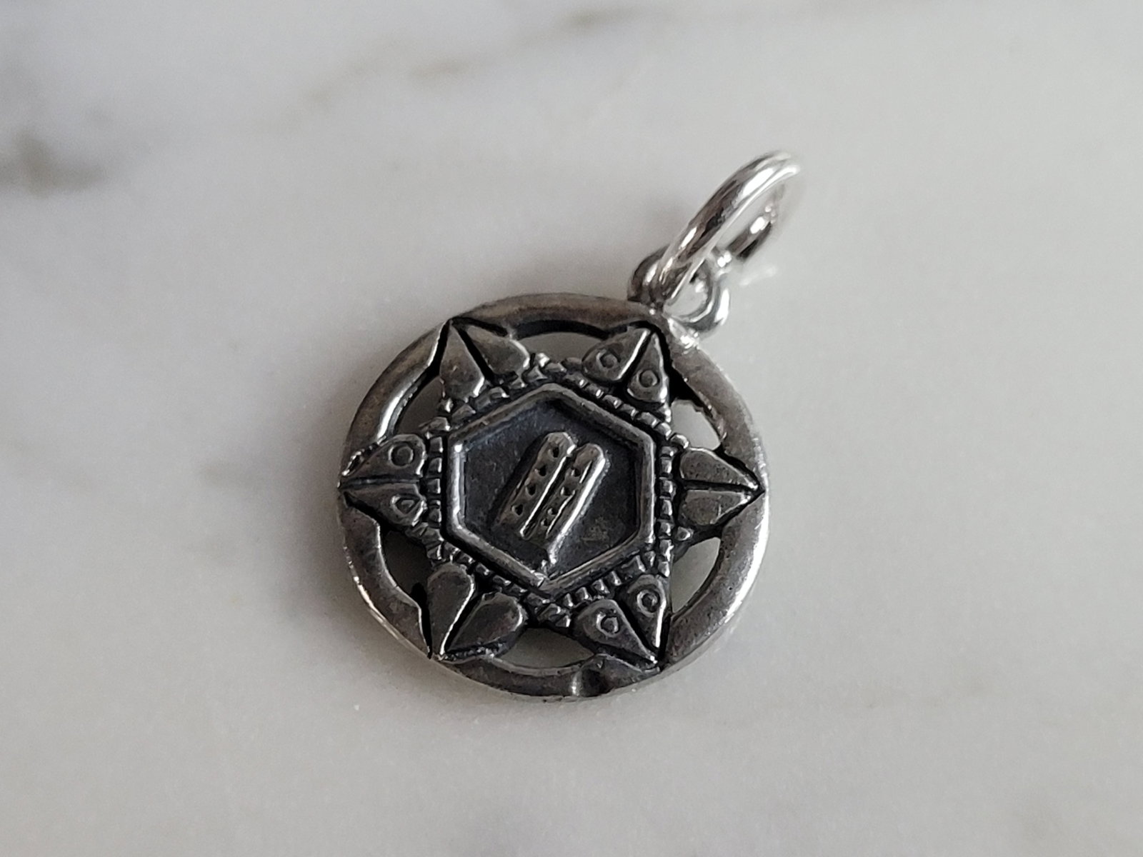 Vintage Sterling Silver Jewish Judaica Star of David Torah Pendant: A VINTAGE ESTATE STERLING SILVER JEWISH HEBREW TORAH PENDANT. PENDANT WEIGHS 2.0g, AND MEASURES 7/8" LONG BY 1/2" WIDE. MAKES A GREAT GIFT FOR THAT SOMEONE SPECIAL. ANY QUESTIONS, PLEASE ASK. BE SURE 
