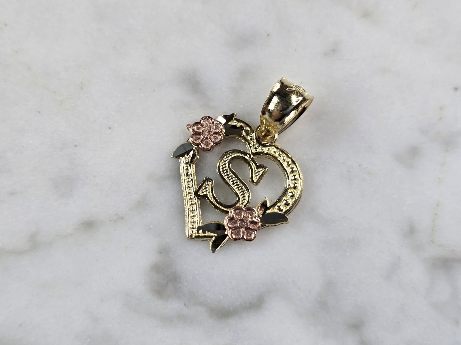 Womens 10K Yellow & Rose Gold Initial Letter " S " Heart Pendant: A WOMENS 10K YELLOW & ROSE GOLD "S" HEART PENDANT. PENDANT MEASURES 3/4" LONG BY 5/8" WIDE. TOTAL WEIGHT OF THE PENDANT IS 0.9g. WOULD MAKE A LOVELY GIFT FOR THAT SOMEONE SPECIAL. ANY QUESTIONS PLEASE