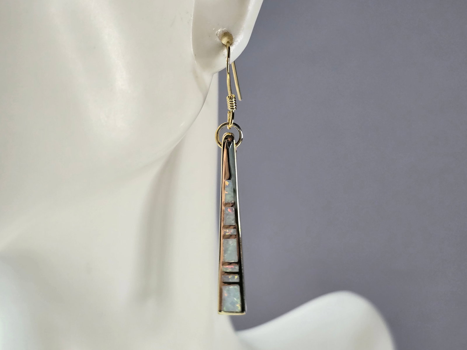 Womens Sterling Silver Gold Tone Modernist Opal Earrings: A PAIR OF WOMENS STERLING SILVER GOLD TONE MODERNIST OPAL COLORED EARRINGS THAT WEIGH 7.0g AND MEASURES 1 7/8" LONG BY 1/4" WIDE. NOT SURE IF STONES ARE NATURAL OR MAN MADE. ANY QUESTIONS, PLEASE DO N