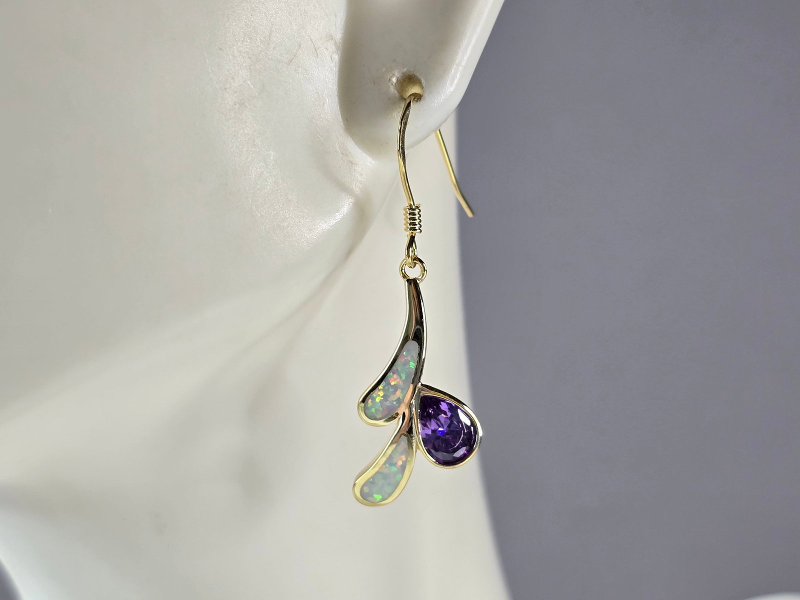 Womens Sterling Silver Gold Tone Modernist Opal Amethyst Earrings: A PAIR OF WOMENS STERLING SILVER GOLD TONE MODERNIST OPAL & AMETHYST COLORED EARRINGS THAT WEIGH 2.7g AND MEASURES 1 1/2" LONG BY 1/2" WIDE. NOT SURE IF STONES ARE NATURAL OR MAN MADE. ANY QUESTIONS, 