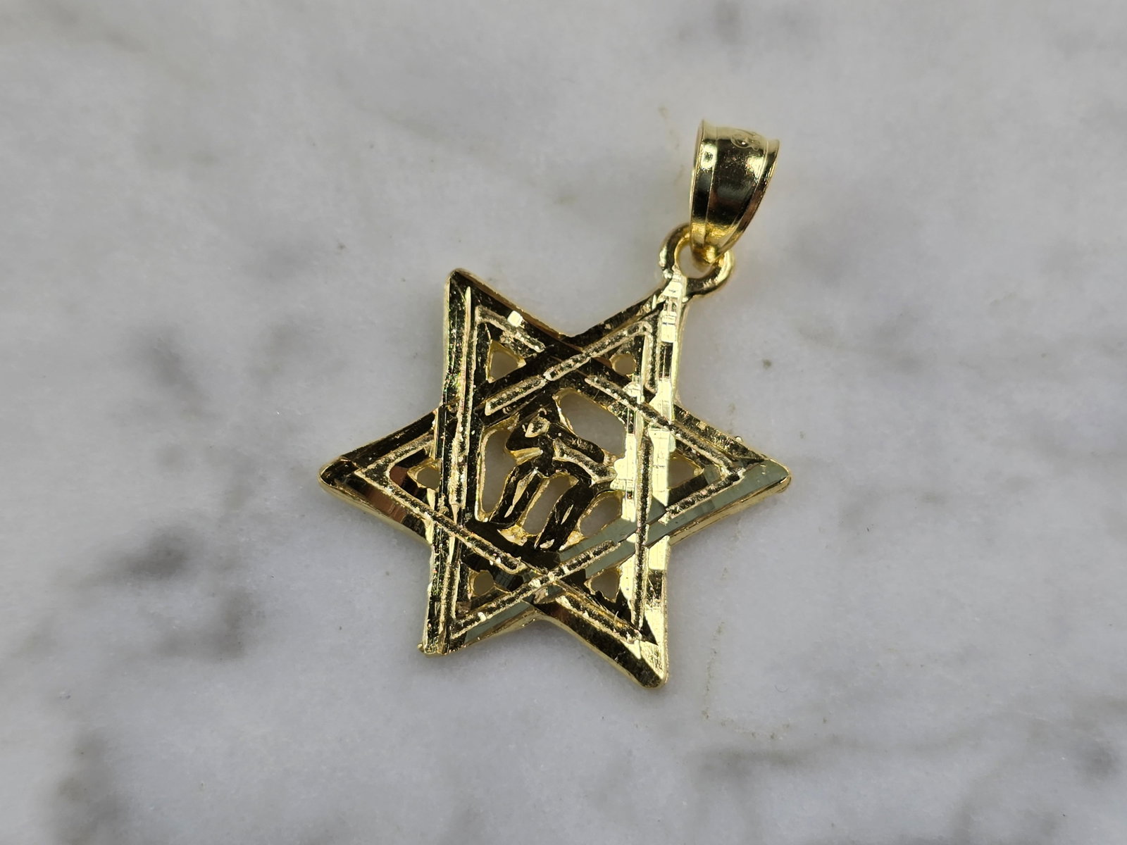 Sterling Silver Gold Tone Jewish Judaica Star of David Chai Pendant: A STERLING SILVER GOLD TONE STAR OF DAVID CHAI PENDANT. THE PENDANT WEIGHS 1.8g AND MEASURES 1 1/8" LONG BY 3/4" WIDE. MAKES A GREAT GIFT FOR THAT SOMEONE SPECIAL. ANY QUESTIONS, PLEASE ASK. BE SURE T