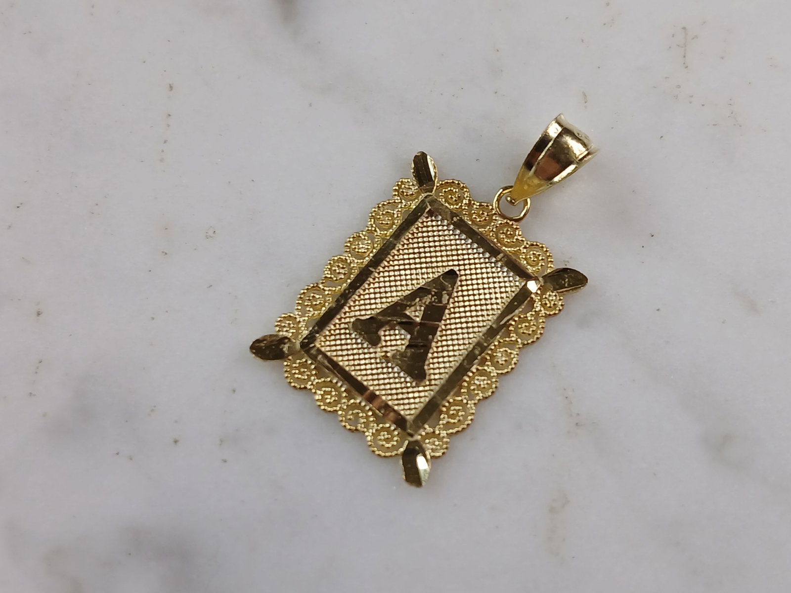 Womens Sterling Silver Gold Tone Initial Letter " A " Pendant: A WOMENS STERLING SILVER GOLD TONE INITIAL LETTER "A" PENDANT. PENDANT WEIGHS 1.3g AND MEASURES 1" LONG BY 5/8" WIDE. MAKES A GREAT GIFT FOR THAT SOMEONE SPECIAL. ANY QUESTIONS, PLEASE ASK. BE SURE TO