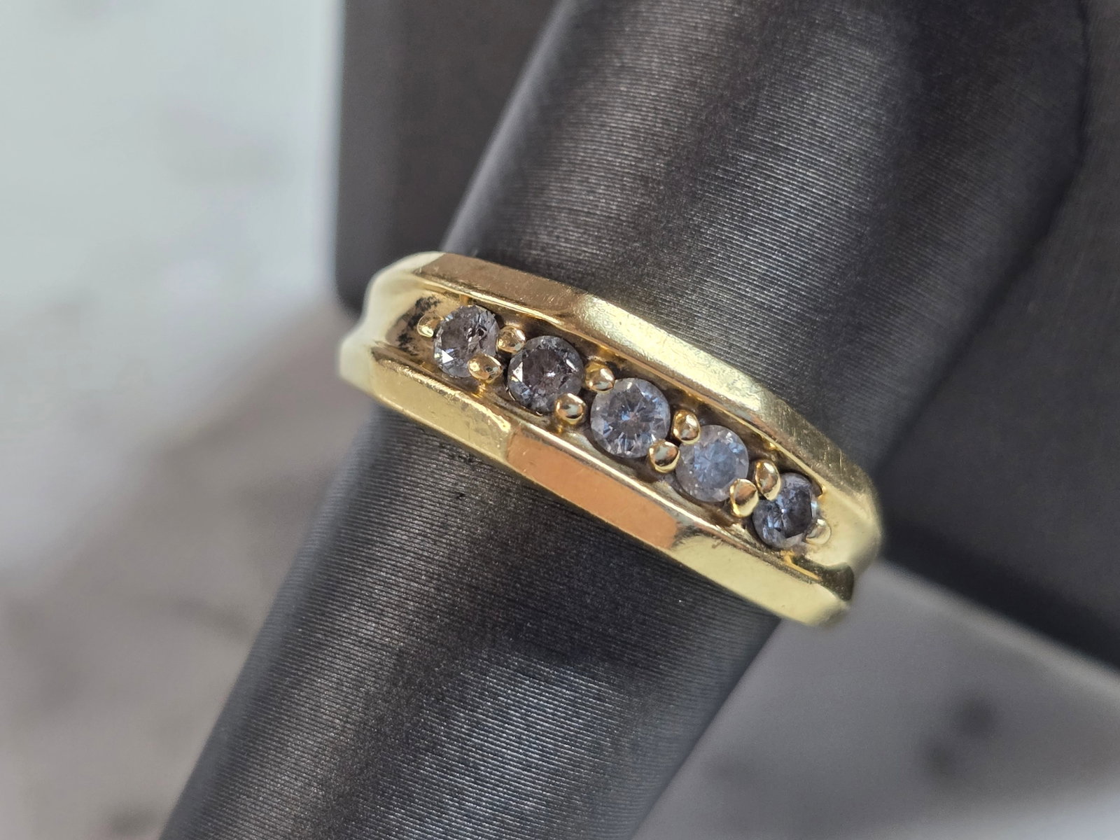 Mens Vintage Estate 14K Yellow Gold Diamond Ring: A MENS VINTAGE 14K YELLOW GOLD DIAMOND RING. THERE ARE ABOUT 0.31cts OF DIAMONDS. THE TOTAL WEIGHT IS 5.0g, AND IS A SIZE 9.25. RING IS NOT MARKED BUT IT HAS BEEN TESTED AND IS GURANTEED TO BE AS DESC