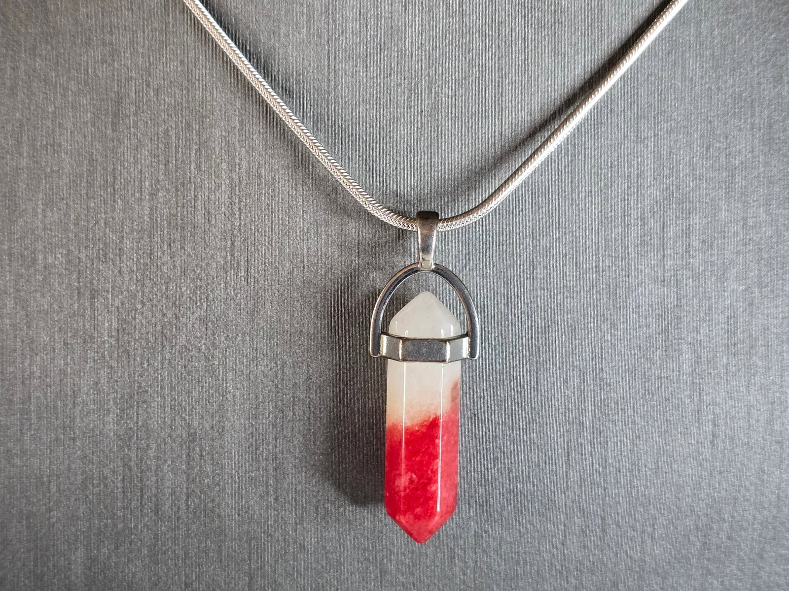 Womens Vintage Estate Sterling Silver Necklace w/ Prism Pendant: A WOMENS VINTAGE ESTATE STERLING SILVER NECKLACE WITH WHAT APPEARS TO BE A PRISM PENDANT. TOGETHER THEY WEIGH 12.9g. THE NECKLACE MEASURES 18" LONG. THE PENDANT MEASURES 1 1/2" LONG BY 1/2" WIDE. THIS
