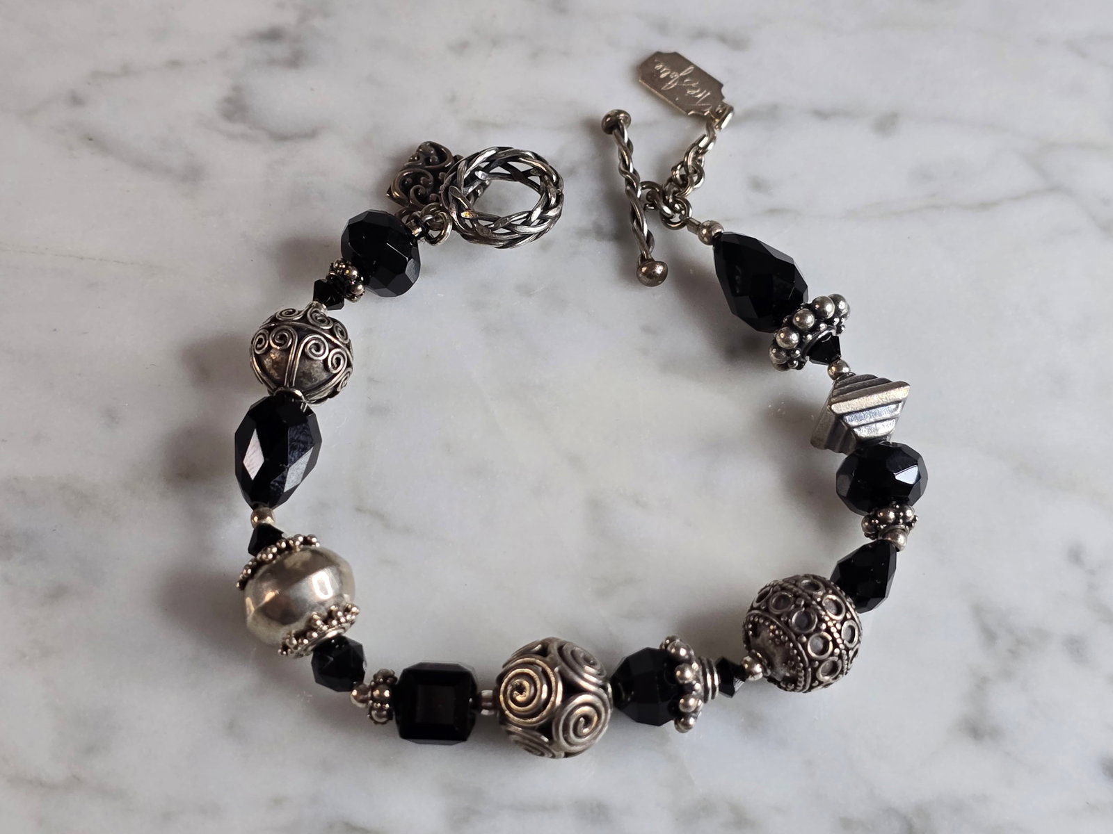 Womens Vintage Estate Sterling Silver Tres Jolie Bracelet: A WOMENS VINTAGE ESTATE STERLING SILVER MODERNIST BRACELET MADE BY TRES JOLIE. BRACELET MEASURES 7 1/2" LONG BY 3/8" WIDE AND WEIGHS 27.0g. THIS WOULD MAKE A LOVELY GIFT FOR THAT SOMEONE SPECIAL. ANY 