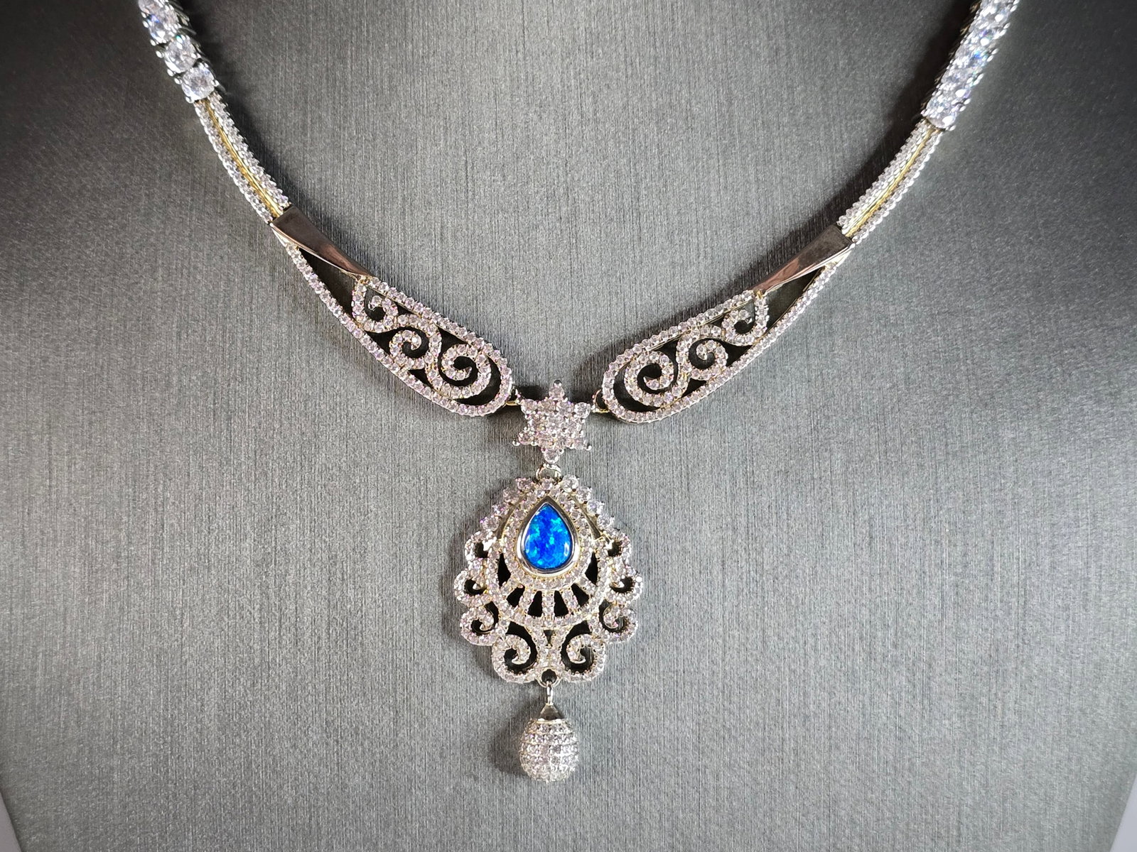 Womens Estate Sterling Silver Modernist Opal Necklace: A BEAUTIFUL WOMENS ESTATE STERLING SILVER MODERNIST OPAL NECKLACE. NOT SURE IF STONE IS NATURAL OR MAN MADE. THE NECKLACE MEASURES 20" LONG, AND WEIGHS 26.7g. PENDANT HANGS 1 3/4". WOULD MAKE A GREAT 