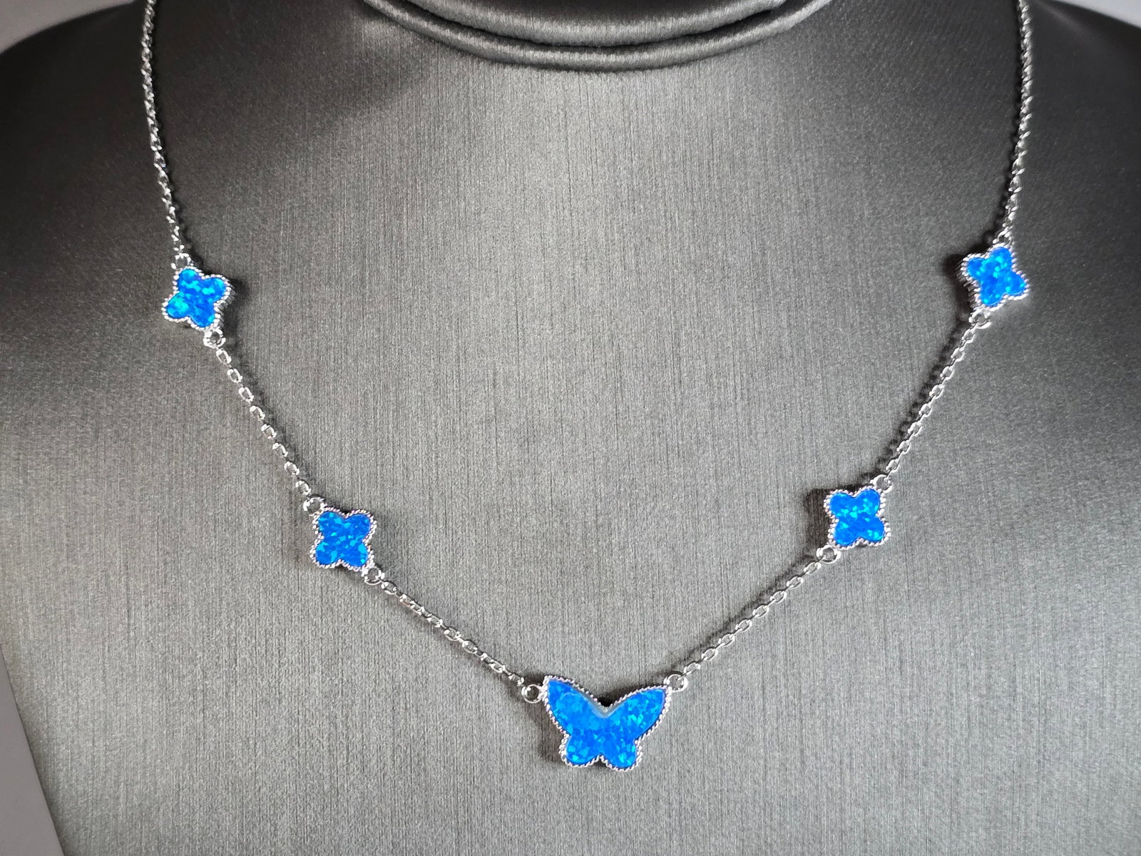Womens Estate Sterling Silver Modernist Butterfly Opal Necklace: A BEAUTIFUL WOMENS ESTATE STERLING SILVER MODERNIST BUTTERFLY OPAL NECKLACE. NOT SURE IF STONE IS NATURAL OR MAN MADE. THE NECKLACE MEASURES 18" LONG, AND WEIGHS 8.9g. THE WIDTH IS 1/2". WOULD MAKE A 