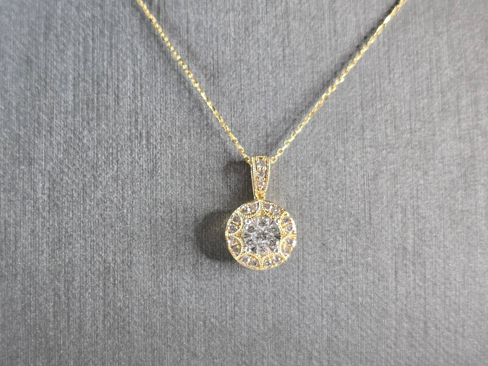 Womens Vintage Estate 10k Gold Diamond Modernist Pendant Necklace: A VINTAGE ESTATE 10K YELLOW GOLD DIAMOND MODERNIST PENDANT WITH NECKLACE. TOTAL WEIGHT IS 3.1g. THE NECKLACE MEASURES 18" LONG, AND THE PENDANT MEASURES 5/8" BY 1/2". THERE IS 30 SMALL DIAMONDS IN THE