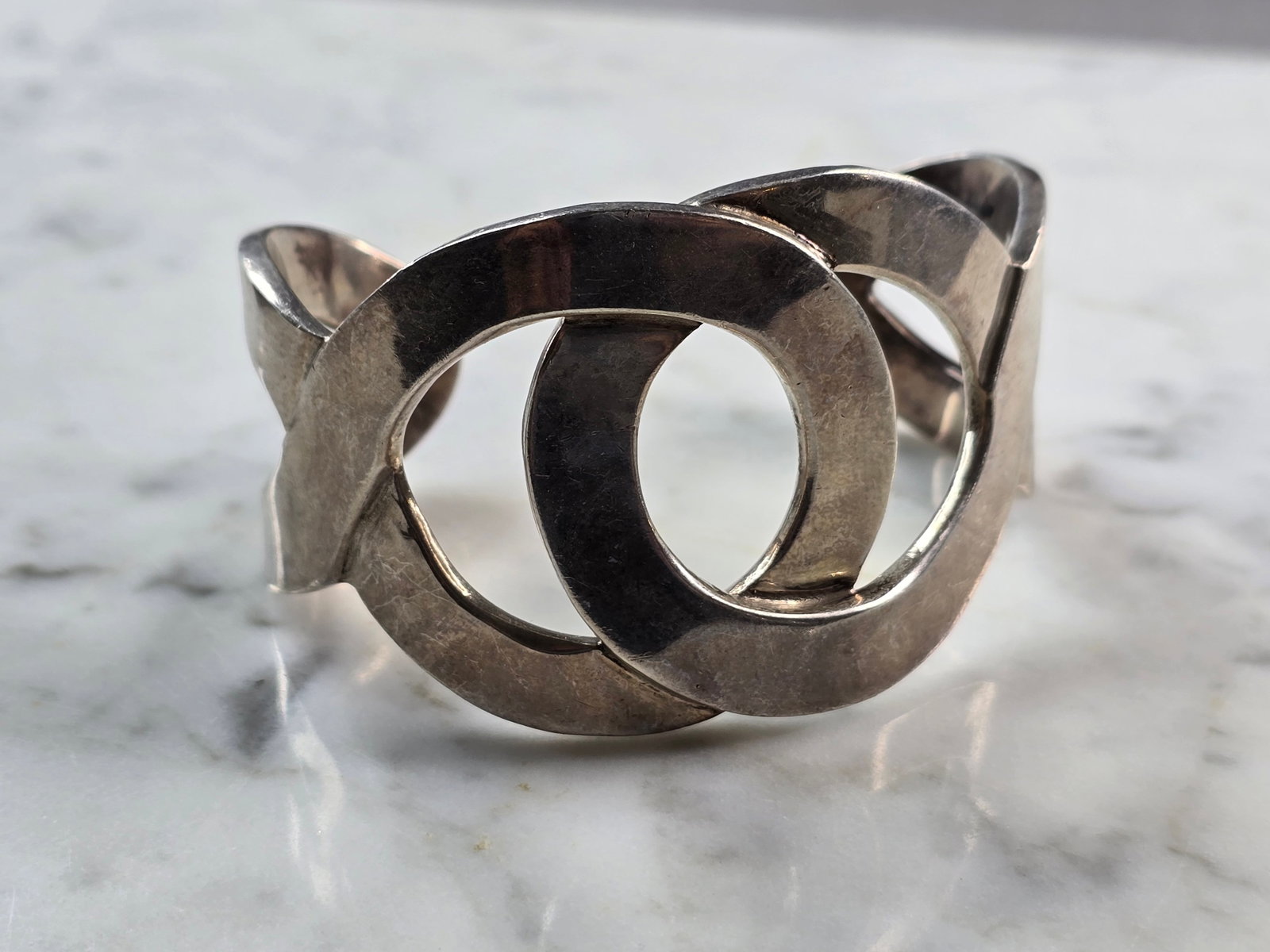 Womens Sterling Silver .950 Modernist Cuff Bracelet: FOR SALE IS THIS WONDERFUL WOMENS VINTAGE ESTATE STERLING .950 MODERNIST CUFF BRACELET. THE BRACELET WEIGHS 84.2g AND IS ABOUT 1 5/8" WIDE. THE CIRCUMFERENCE WITH THE GAP IS 6 1/2". ANY QUESTIONS PLEA