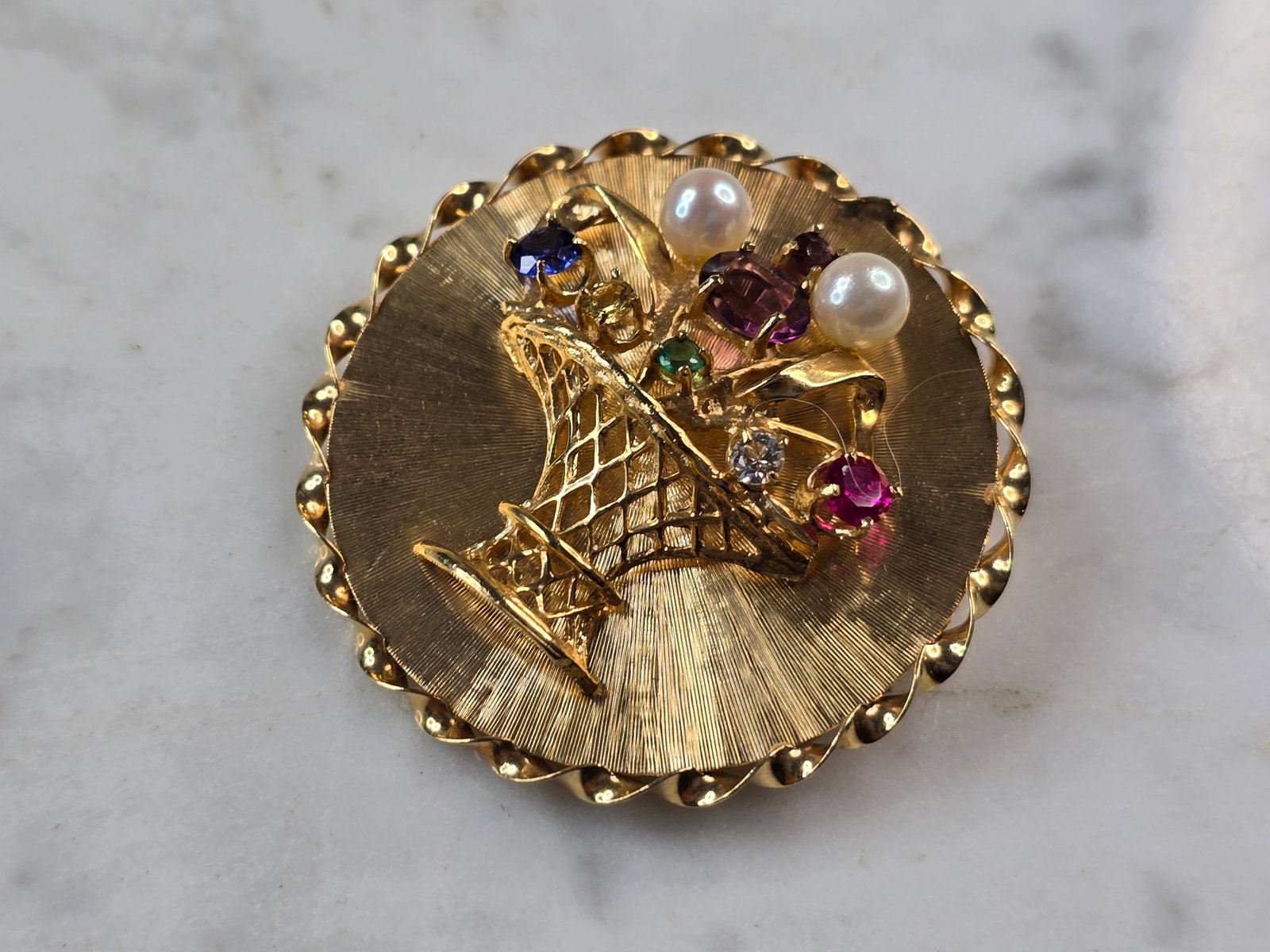 Womens Vintage Estate 14K Yellow Gold Birthstone Basket Brooch: FOR SALE IS THIS LOVELY VINTAGE ESTATE 14K YELLOW GOLD BIRTHSTONE BASKET BROOCH. NOT SURE IF THE STONES ARE NATURAL OR MAN MADE. THE BROOCH MEASURES 1 5/8" WIDE, AND WEIGHS 13.1g. WOULD MAKE A GREAT G