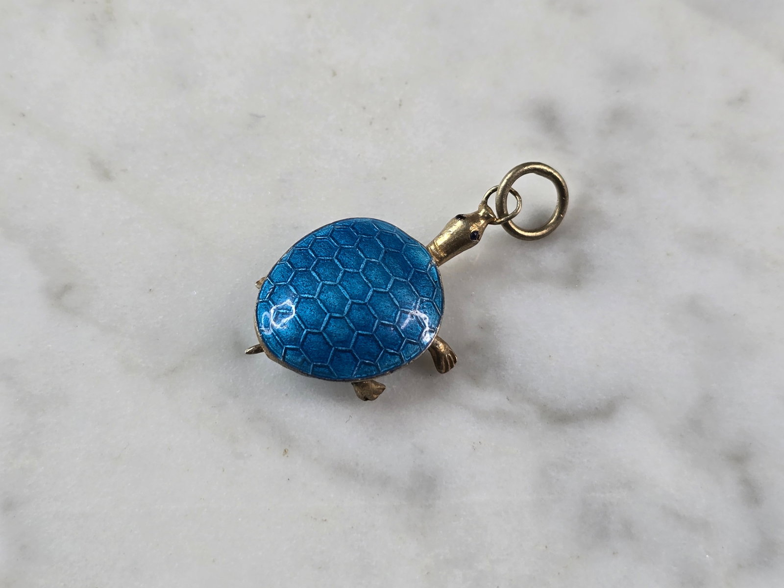 Womens Vintage Estate Asian Cloisonne Enamel Turtle Charm Pendant: A WOMENS VINTAGE ESTATE CLOISONNE ENAMEL TURTLE CHARM PENDANT. THE PENDANT IS MARKED SILVER, HOWEVER NOT SURE OF ITS PURITY THOUGH. THE PENDANT MEASURES 1 1/8" LONG AND 5/8" WIDE. THE NECK SLIDES BACK