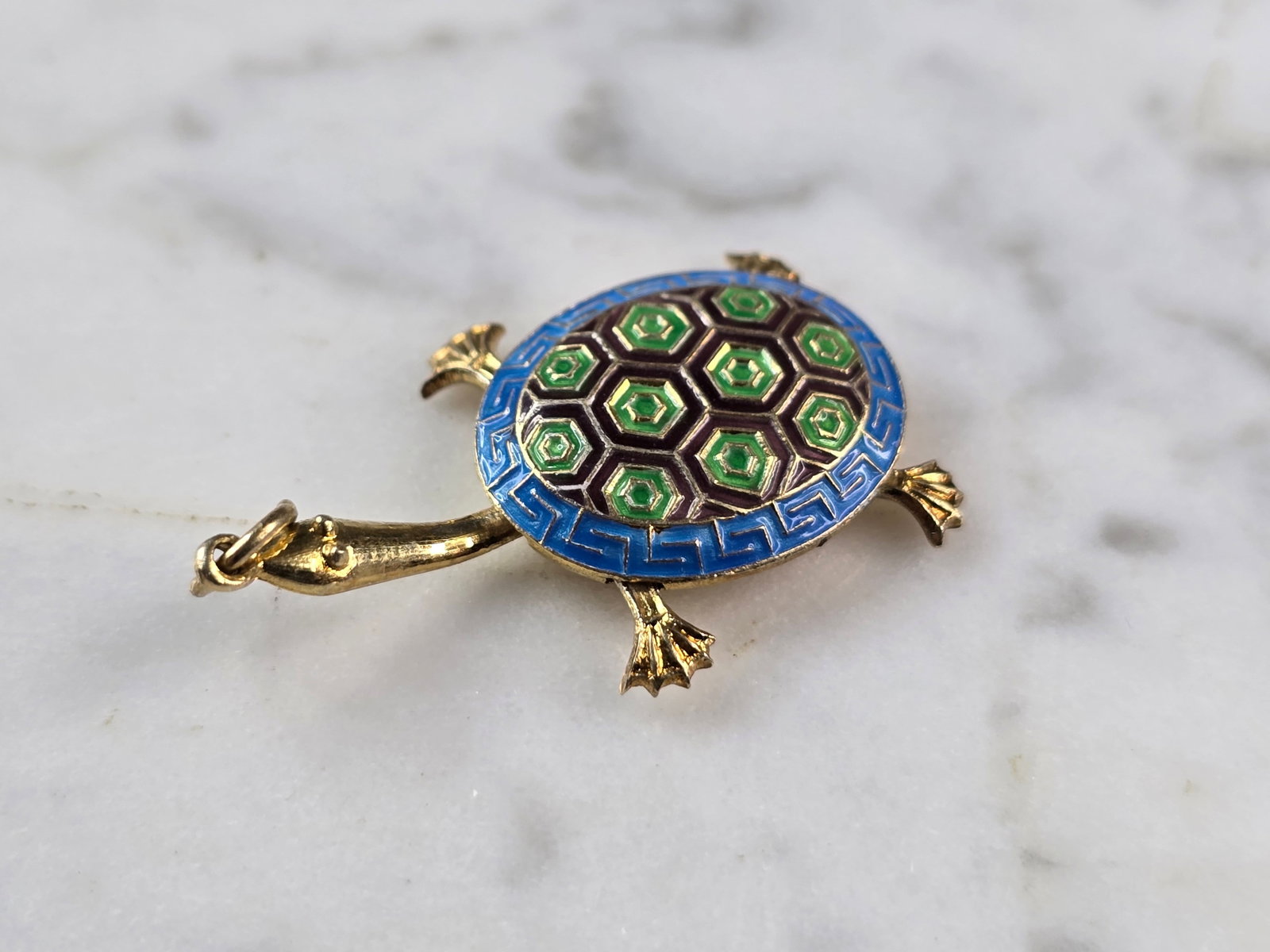 Womens Vintage Estate Asian Cloisonne Enamel Turtle Charm Pendant: A WOMENS VINTAGE ESTATE CLOISONNE ENAMEL TURTLE CHARM PENDANT. THE PENDANT IS MARKED SILVER, HOWEVER NOT SURE OF ITS PURITY THOUGH. THE PENDANT MEASURES 1 1/4" LONG AND 3/4" WIDE. THE NECK SLIDES BACK