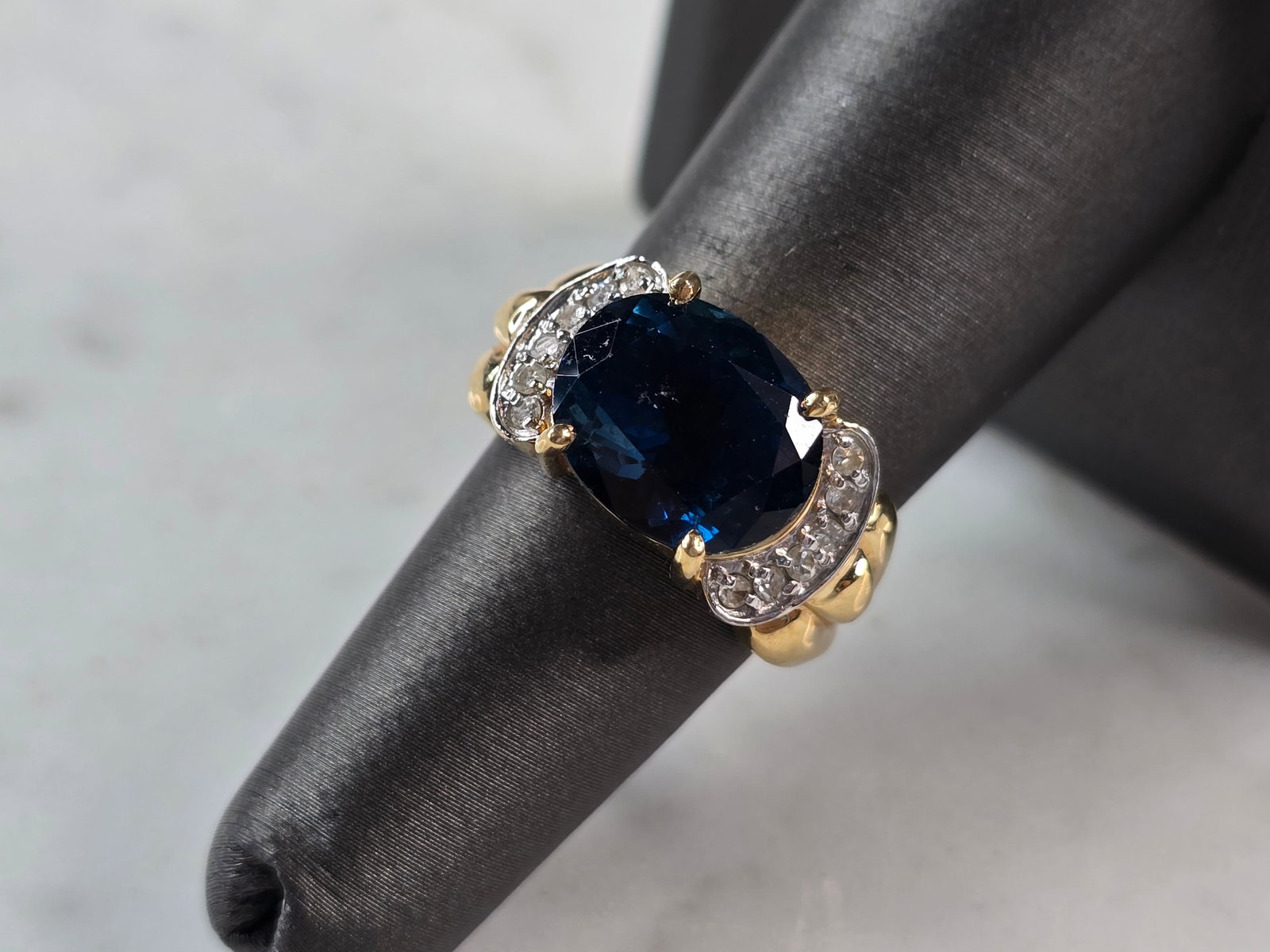Womens Vintage 14K Gold Blue Zircon & Diamond Ring: FOR SALE IS THIS WONDERFUL 14K YELLOW GOLD RING WITH WHAT APPEARS TO BE A BLUE ZIRCON STONE ACCENTED BY TINY DIAMONDS. DIAMONDS ARE ABOUT .36cts. NOT SURE IF IT IS A REAL ZIRCON OR MAN MADE. THE RING 