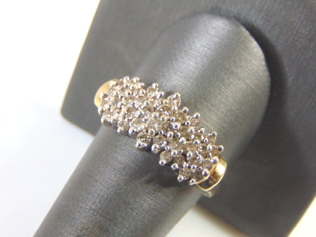 Women's Vintage Estate 14K Gold Diamond Cluster Ring: FOR SALE IS THIS ATTRACTIVE LARGE 14K YELLOW GOLD DIAMOND CLUSTER RING . EACH OF THE 38 DIAMOND IS ABOUT .03 - .04 CTS, TOTALING MORE THAN 1.2 CTS OF DIAMONDS, THE RING WEIGHS 5.6g. AND IS A SIZE 11.0