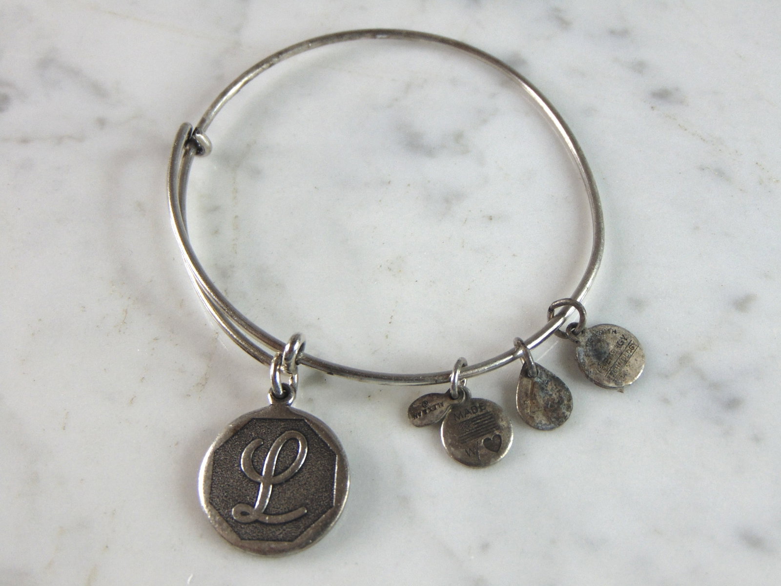 Womens Vintage Estate Alex & Ani "L" Charm Bracelet: FOR SALE IS A LOVELY VINTAGE ESTATE ALEX AND ANI "L" CHARM BRACELET, THAT WEIGHS 11.2g. THE BRACELET IS EXPANDABLE FROM ABOUT 2" TO 3.5". ANY QUESTIONS PLEASE DO NOT HESITATE TO ASK. BE SURE TO CHECK 