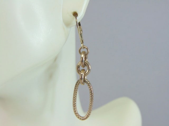 Womens Vintage Sterling Silver Modernist Earrings: A PAIR OF WOMENS STERLING SILVER MODERNIST EARRINGS. EARRINGS WEIGH 5.8g AND MEASURES 2" LONG BY 3/8" WIDE. ANY OTHER QUESTIONS, PLEASE DO NOT HESITATE TO ASK. BE SURE TO CHECK OUT SOME OF MY OTHER GR