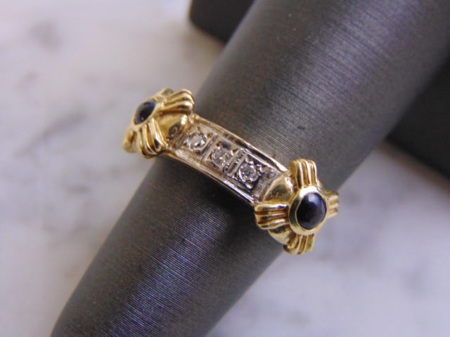 Women's Vintage Estate 14K Gold Sapphire & Diamond Ring: FOR SALE IS THIS LOVELY VINTAGE ESTATE 14K GOLD RING WITH DIAMONDS AND A TINY SAPPHIRES. THE RING IS A SIZE 5.5, AND WEIGHS 5.6g. THERE ARE ABOUT .09cts OF DIAMONDS. RING IS NOT MARKED BUT IT HAS BEEN