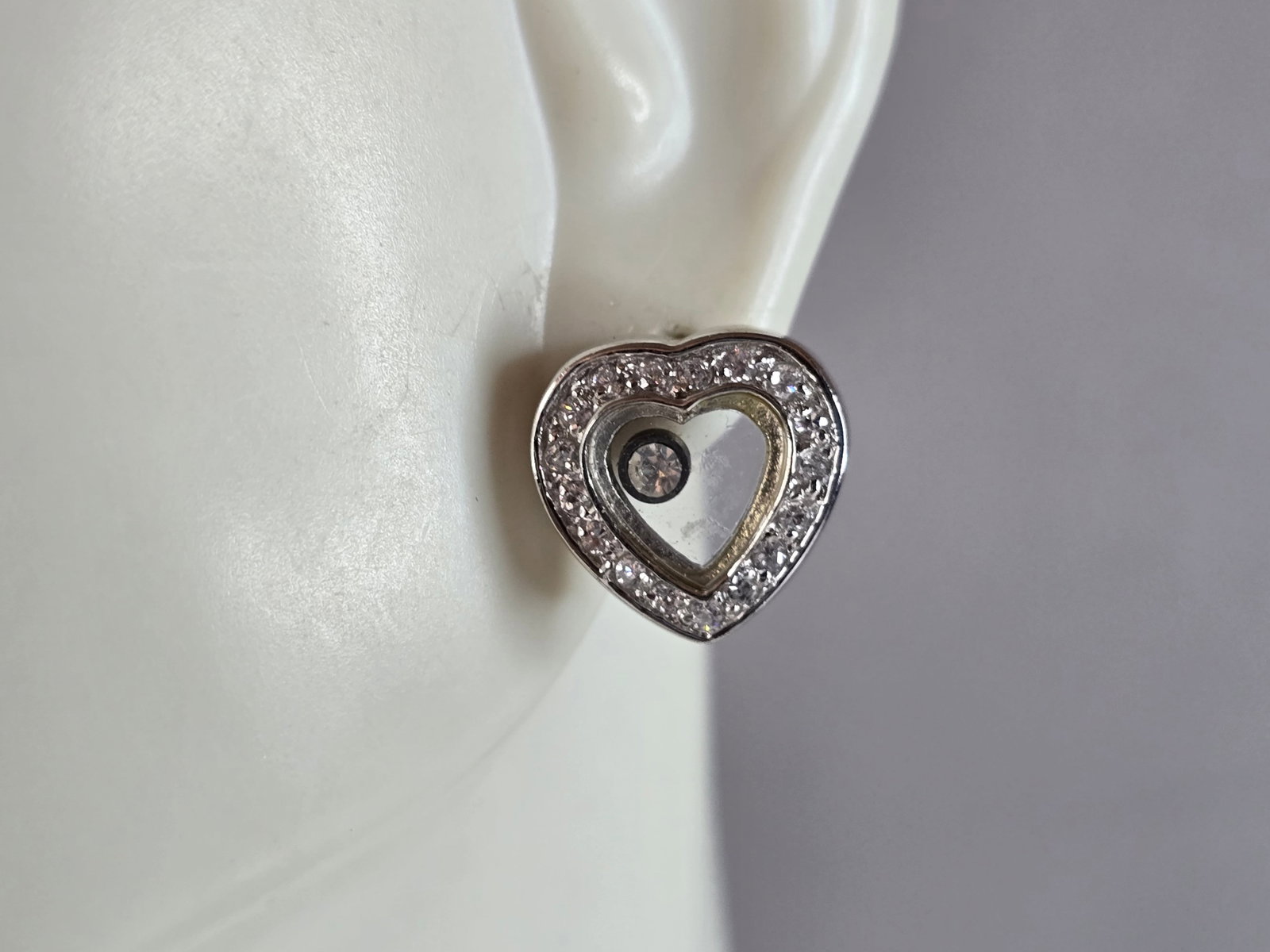 Womens Vintage Estate Sterling Silver CZ Heart Earrings: A PAIR OF WOMENS STERLING SILVER CZ STUD HEART EARRINGS THAT WEIGH 5.8g, AND MEASURE 1/2" LONG BY 1/2" WIDE. ANY QUESTIONS, PLEASE DO NOT HESITATE TO ASK. BE SURE TO CHECK OUT SOME OF MY OTHER GREAT I