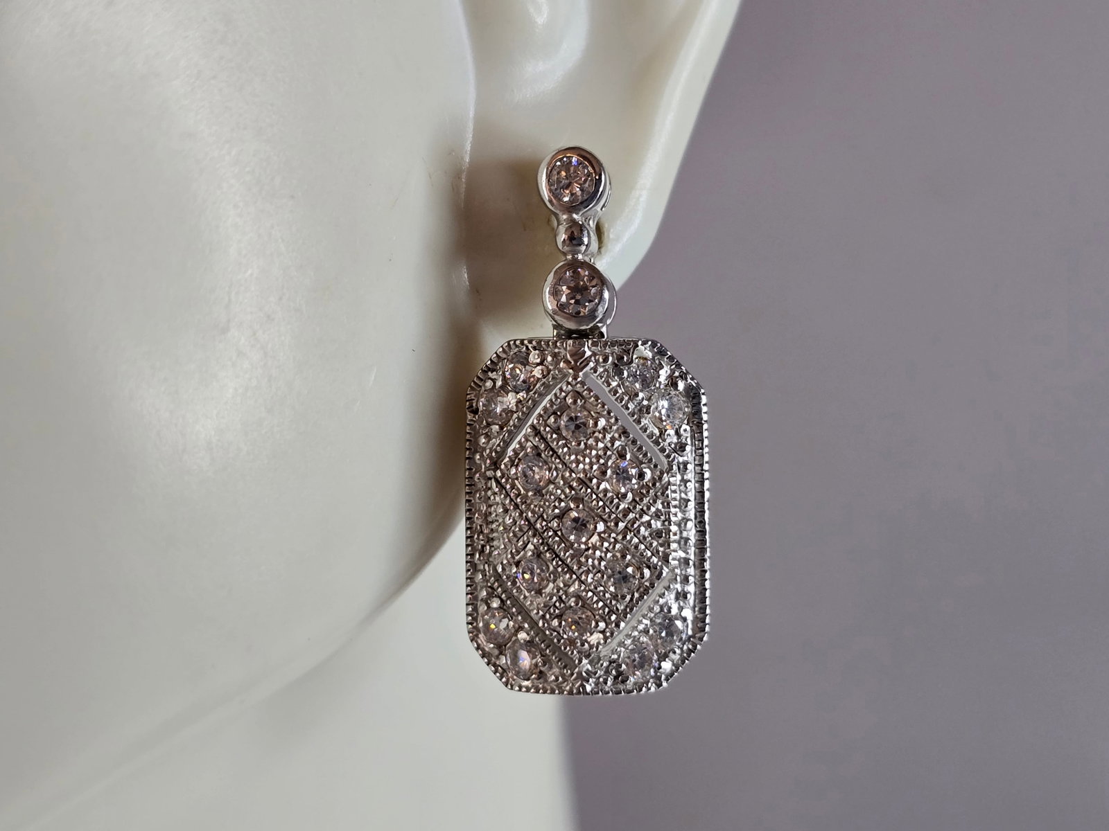 Womens Vintage Estate Sterling Silver Modernist CZ Earrings: A PAIR OF WOMENS STERLING SILVER MODERNIST CZ EARRINGS THAT WEIGH 7.2g AND MEASURE 1" LONG BY 1/2" WIDE. ANY QUESTIONS, PLEASE DO NOT HESITATE TO ASK. BE SURE TO CHECK OUT SOME OF MY OTHER GREAT ITEMS