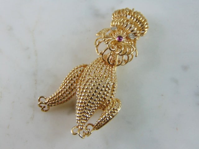 Womens Vintage Estate 14K Yellow Gold Poodle Brooch: FOR SALE IS THIS WONDERFUL WOMENS 14K YELLOW GOLD POODLE BROOCH. THE BROOCH WEIGHS 10.9g AND HAS ABOUT .10cts OF DIAMONDS. BROOCH MEASURES 2 1/8" LONG BY 1 1/4" WIDE. ANY QUESTIONS PLEASE DO NOT HESIT