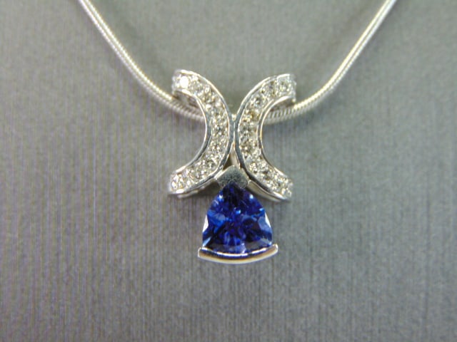 Womens 14K White Gold Diamond & Iolite Pendant: FOR SALE IS THIS LOVELY VINTAGE 14K WHITE GOLD NECKLACE WITH WHAT APPEARS TO BE AN IOLITE AND DIAMOND PENDANT. THE TOTAL WEIGHT IS 8.4g. THE NECKLACE MEASURES 16" LONG, AND THE PENDANT MEASURES 1/2" B