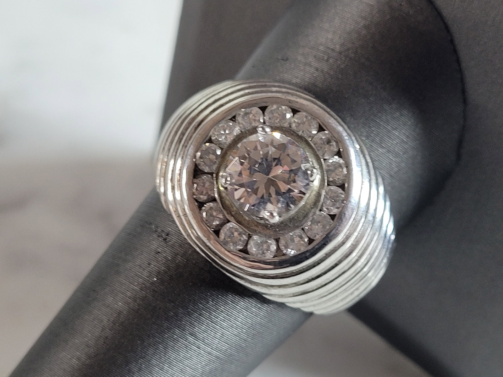 Mens Vintage Estate Sterling Silver CZ Ring: A MENS VINTAGE ESTATE STERLING SILVER CZ RING. THE RING IS A SIZE 11.0 AND WEIGHS 9.1g. THE WIDTH OF THE RING IS ABOUT 5/8". THE RING MAKES A BEAUTIFUL, IMPRESSIVE GIFT FOR THAT SOMEONE SPECIAL. ANY Q
