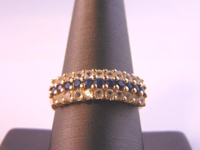 Womens Vintage Estate 14K Yellow Gold CZ & Sapphire Ring: FOR SALE IS THIS WONDERFUL WOMENS 14K YELLOW GOLD WITH CZ CHIPS AND SAPPHIRE COLORED STONES. NOT SURE IF THE SAPPHIRES ARE REAL OR MANMADE. THE RING WEIGHS 4.9g. THE SIZE OF THE RING IS 10.0. ANY QUES