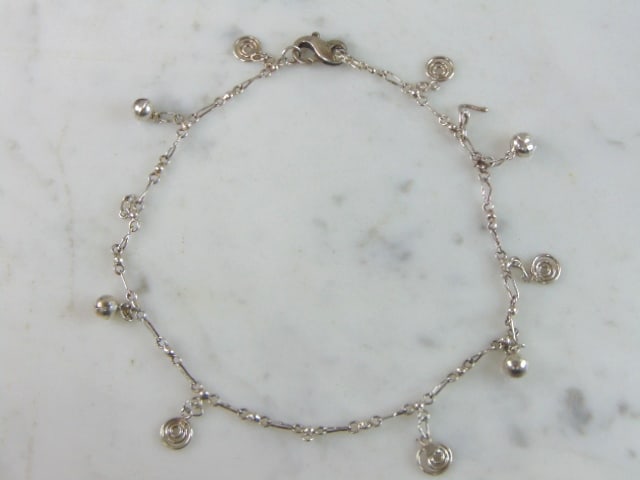 Womens Vintage Estate Sterling Silver Charm Bracelet: A LOVELY VINTAGE ESTATE STERLING SILVER CHARM BRACELET. BRACELET MEASURES 10 1/4" LONG BY 1/2" WIDE AND WEIGHS 6.1g. THIS WOULD MAKE A LOVELY GIFT FOR THAT SOMEONE SPECIAL. ANY QUESTIONS, PLEASE DON'T