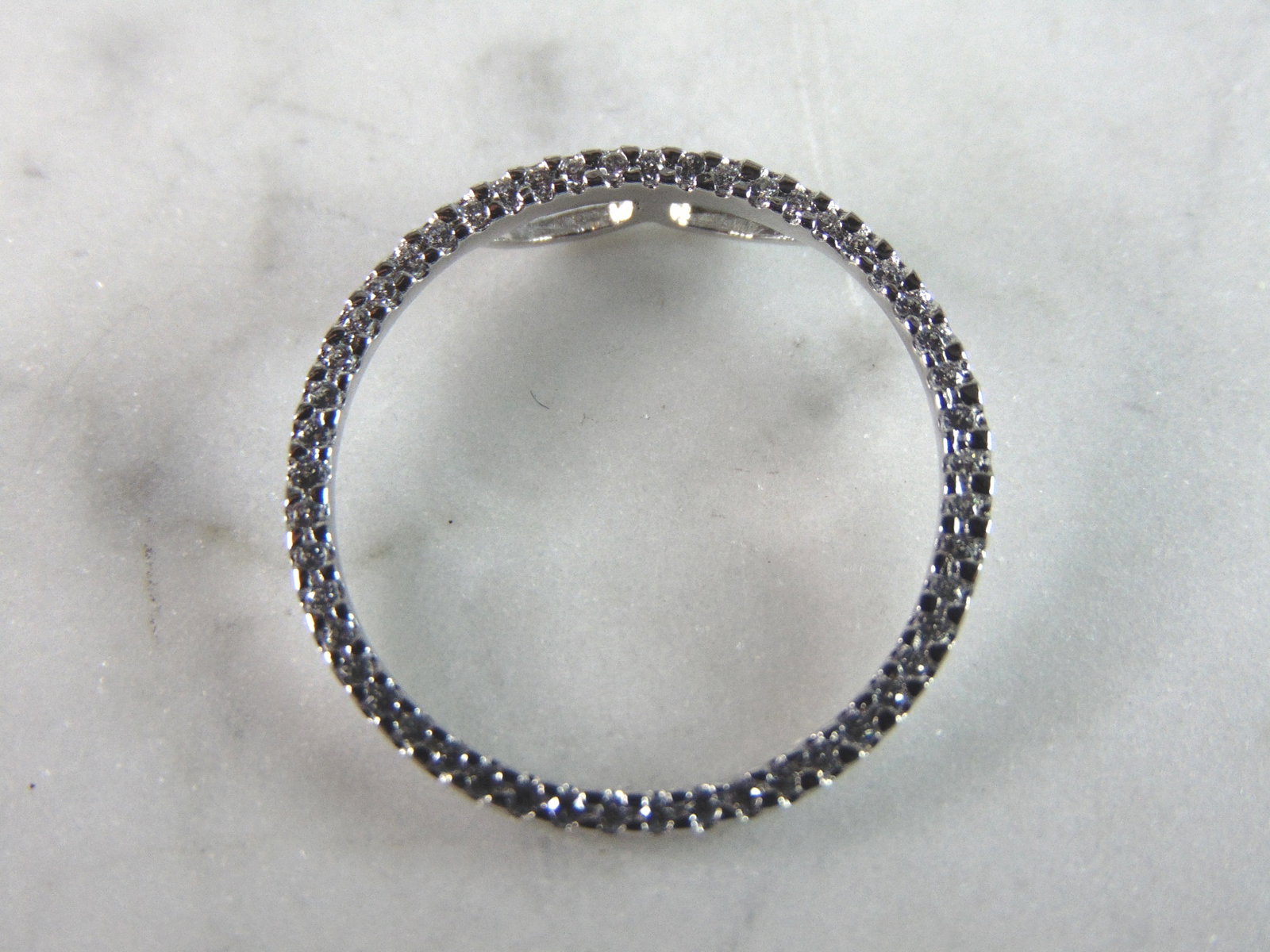 Womens Vintage Estate Sterling Silver CZ Eternity Pendant: A WOMENS VINTAGE ESTATE STERLING SILVER CZ ETERNITY PENDANT. PENDANT WEIGHS 1.2g AND PENDANT MEASURES 7/8" IN DIAMETER. MAKES A GREAT GIFT FOR THAT SOMEONE SPECIAL. ANY QUESTIONS, PLEASE ASK. BE SURE 