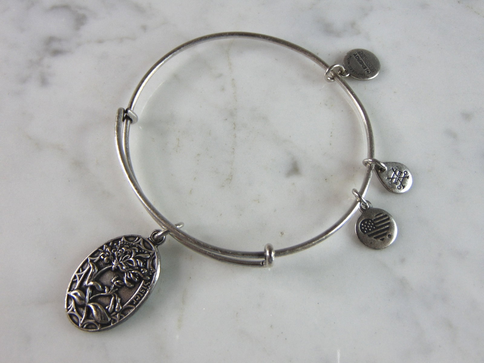 Womens Vintage Estate Alex & Ani Sister Charm Bracelet: A LOVELY VINTAGE ESTATE ALEX AND ANI SISTER CHARM BRACELET, THAT WEIGHS 11.7g. THE BRACELET IS EXPANDABLE FROM ABOUT 2" TO 3.5". ANY QUESTIONS PLEASE DO NOT HESITATE TO ASK. BE SURE TO CHECK OUT SOME 