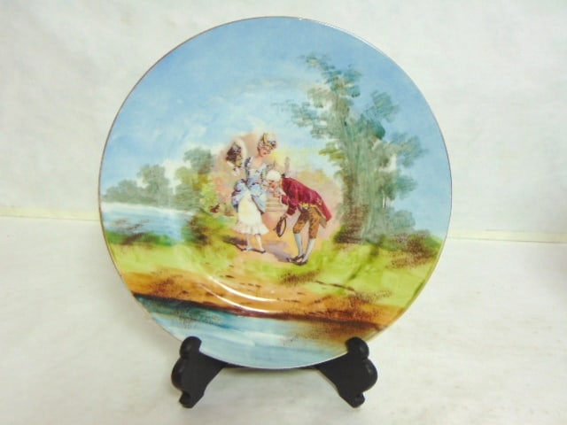 ANTIQUE FRENCH LIMOGES HAND PAINTED PORCELAIN PLATE: A BEAUTIFUL HAND PAINTED ANTIQUE VICTORIAN FRENCH LIMOGES PORCELAIN PLATE THAT MEASURES 10 1/4" IN DIAMETER. CONDITION IS GREAT, NO CHIPS OR CRACKS, AND IS STAMPED ON THE BACK.