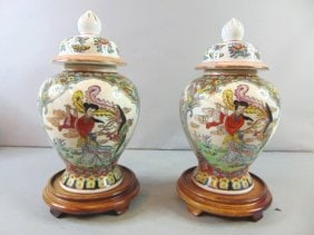 Pair of Chinese Porcelain Rose Medallion Urns w/ Base: FOR SALE IS THIS PAIR OF BEAUTIFUL DECORATIVE CHINESE PORCELAIN ROSE MEDALLION URN. URNS MEASURES ABOUT 12" TALL BY 6 1/2" WIDE. WOODEN BASE MEASURES 1 7/8" BY 7". HAS A GREAT DECORATIVE LOOK AND IS O